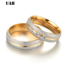 Charger l'image dans la galerie, UAH Stainless steel Wedding Ring Silver Gold Color Simple Design Couple Alliance Ring  Crystal Band Ring for Women and Men
