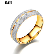 Charger l'image dans la galerie, UAH Stainless steel Wedding Ring Silver Gold Color Simple Design Couple Alliance Ring  Crystal Band Ring for Women and Men